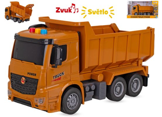 Auto stavební sklápěčka 26cm na setrvačník na baterie se světlem a zvukem v krabičce